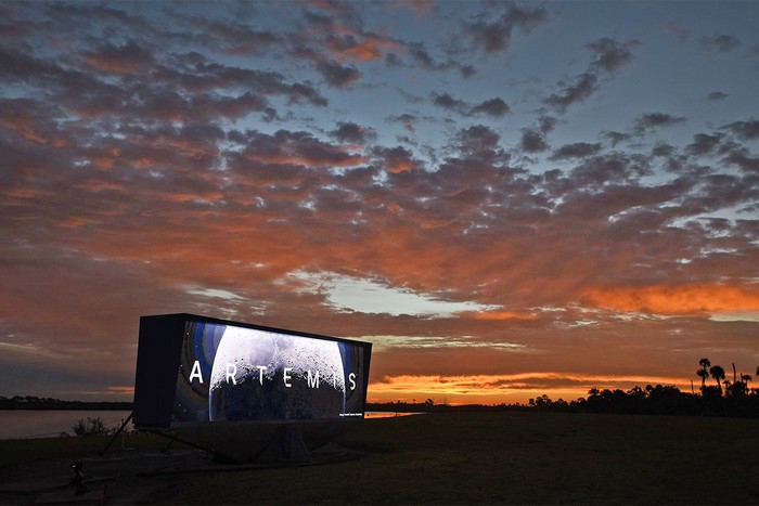 Artemis launch video screen at sunset