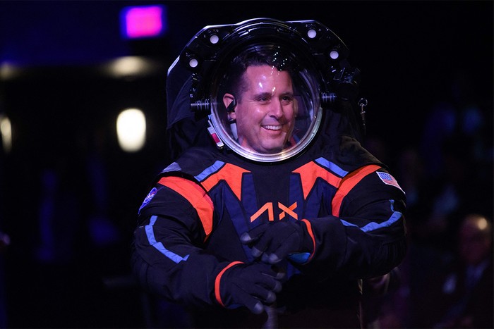 Man in space suit and helmet