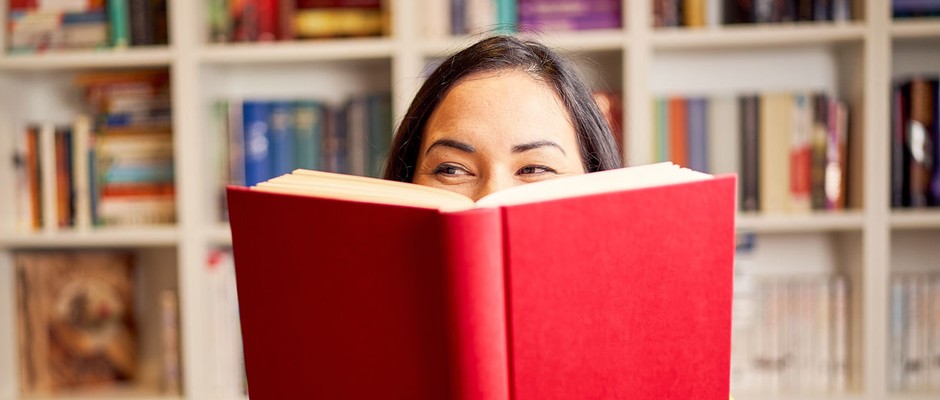 Woman reading self-improvement book