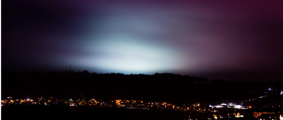 City skyline at night with light pollution