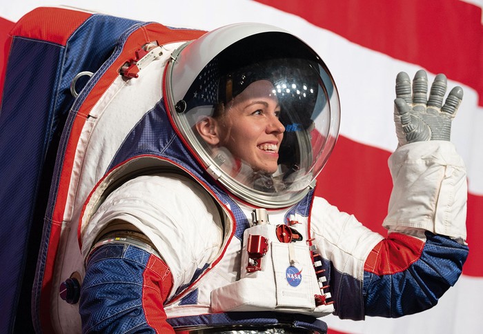 NASA engineer Kristine Davis wears the xEMU suit at its 2019 unveiling