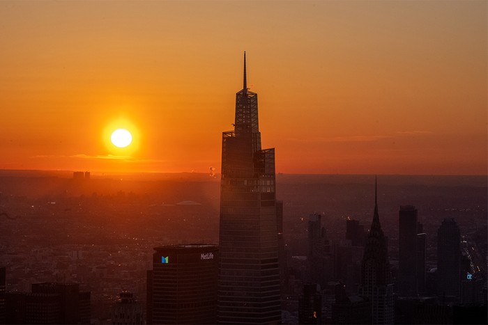 Sun rises over Skyscrapers