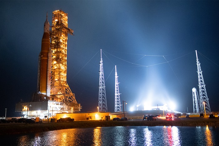 rocket near launchpad at night