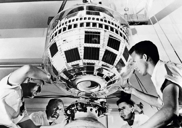 Technicians assemble the Telstar 1 satellite